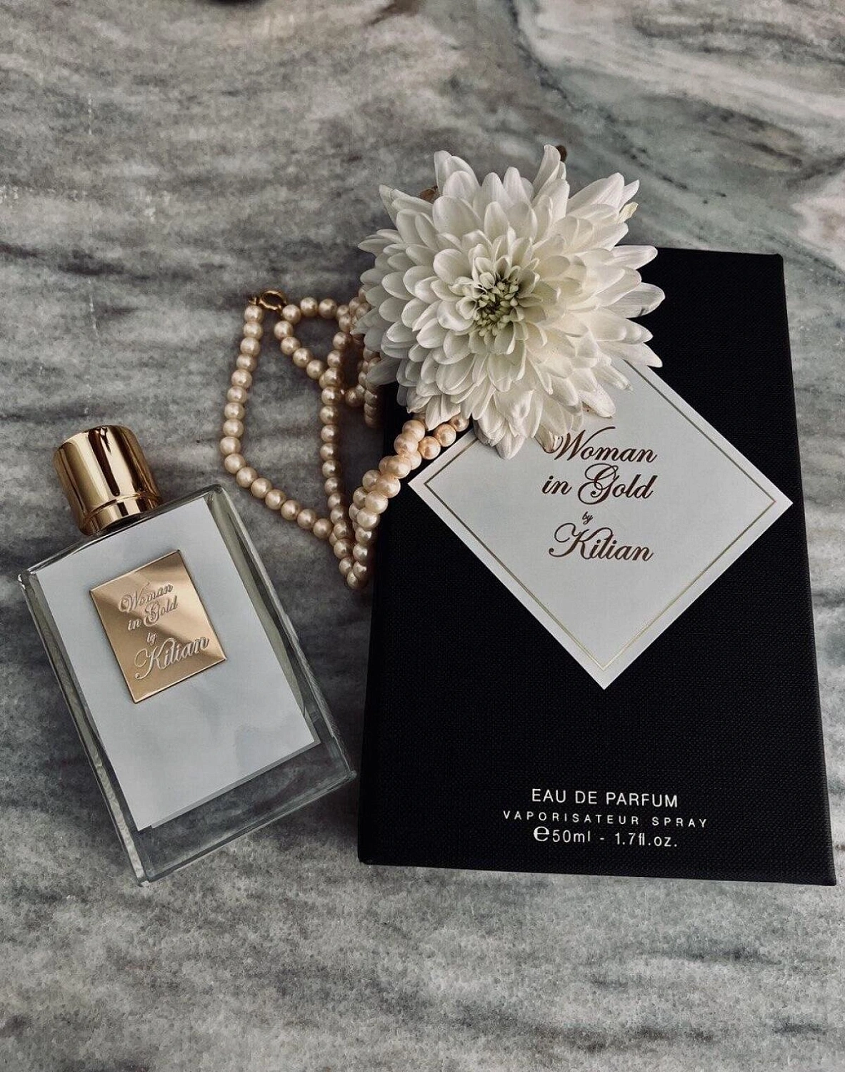 By Kilian Woman in Gold