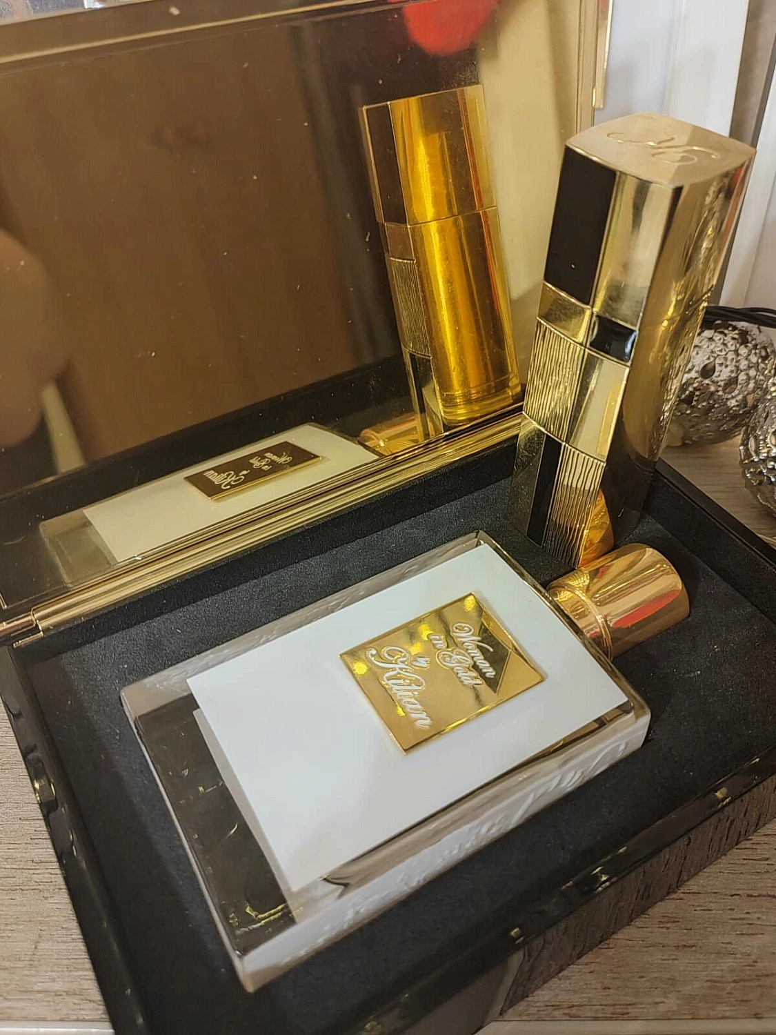 By Kilian Woman in Gold